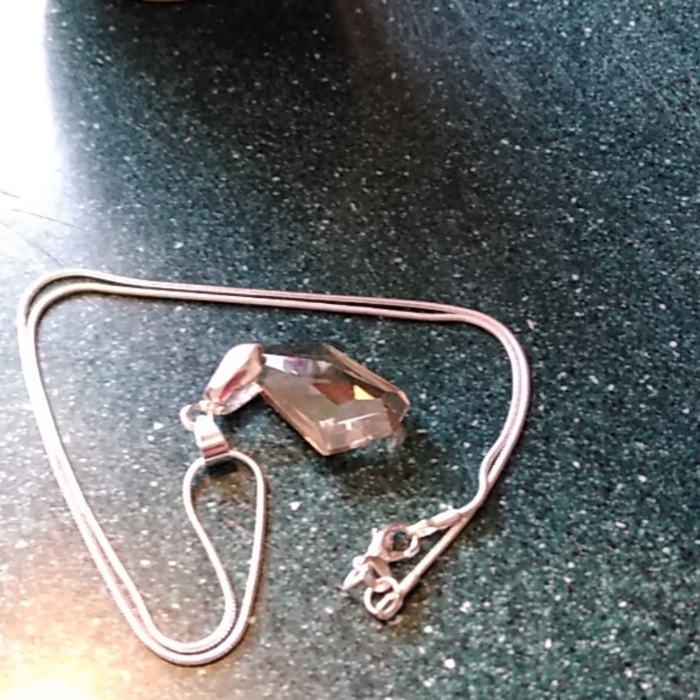 Necklace with silver chain.
